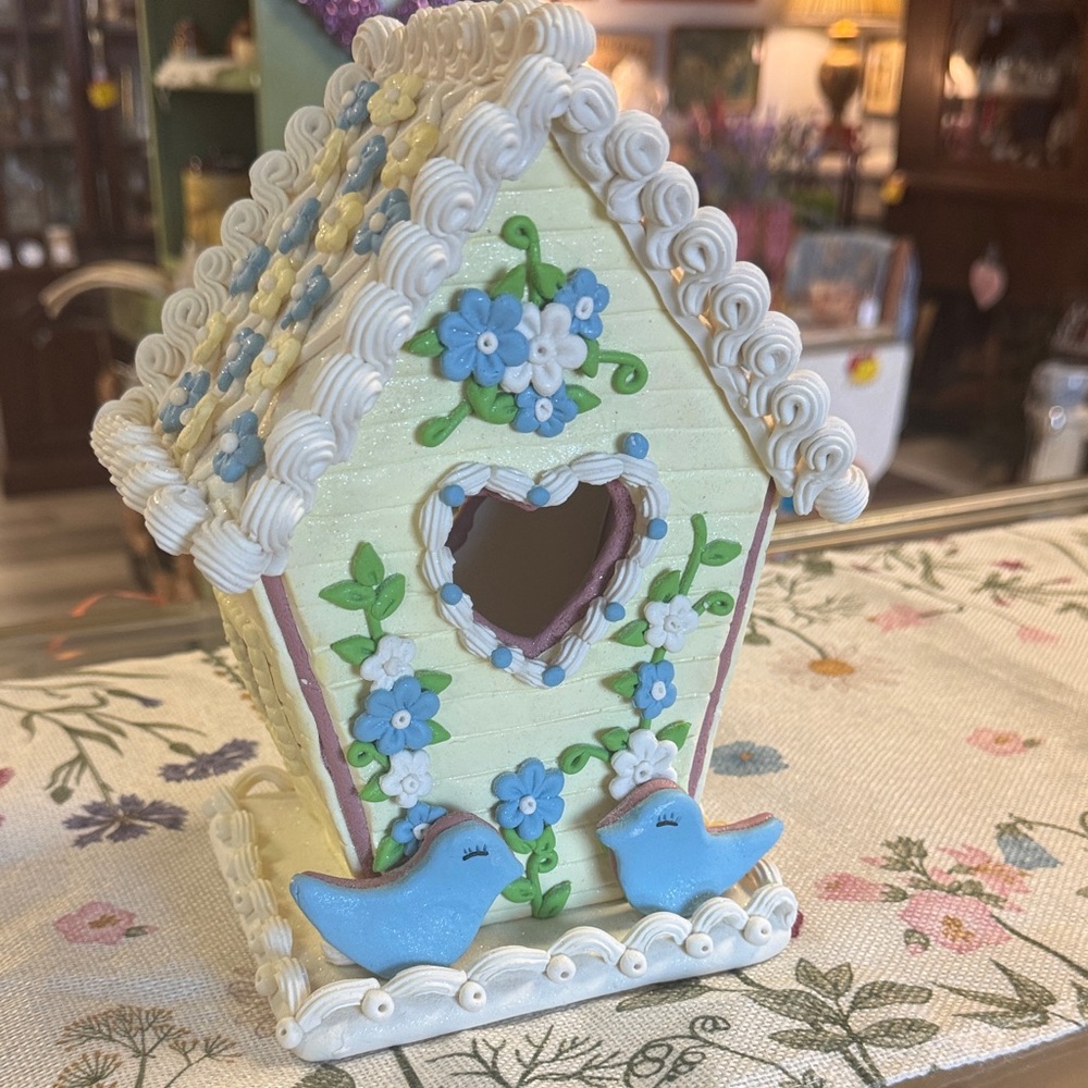 Charming Birdhouse with Blue Accents